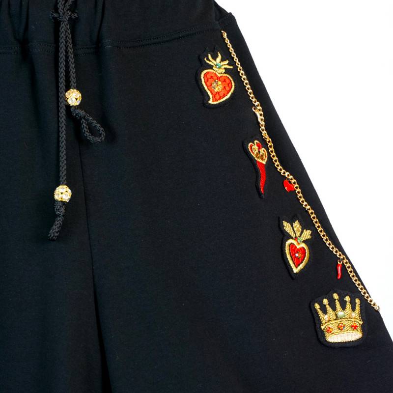 Flare pants with decorative charms