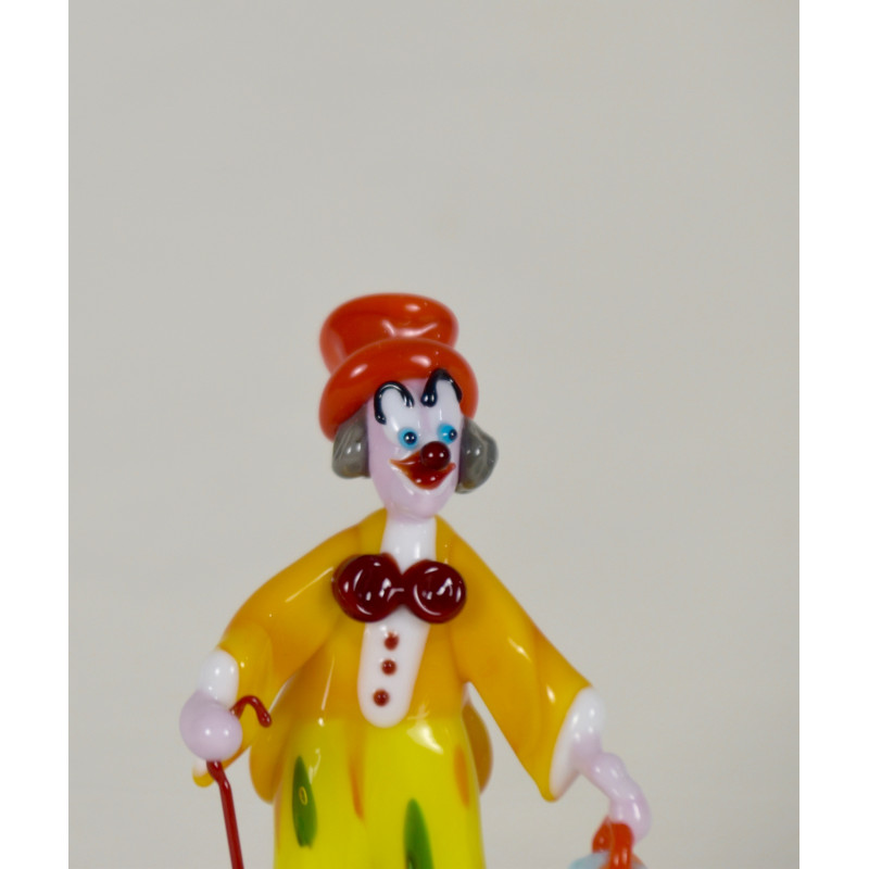 Clown with umbrella and bag