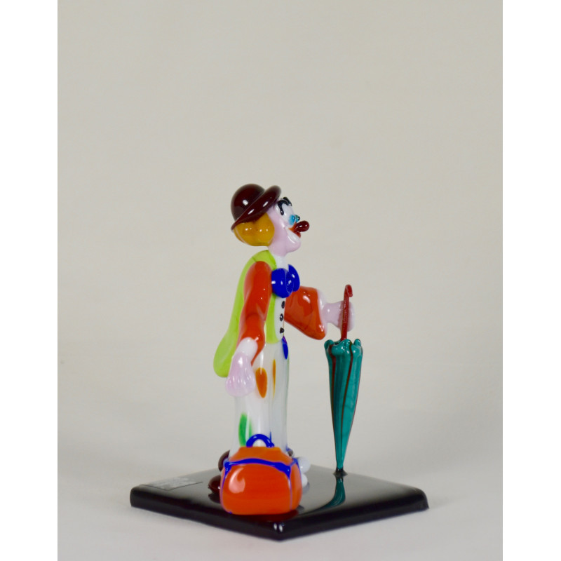 Clown mit Regenschirm und Koffer Clown mit Regenschirm und Koffer