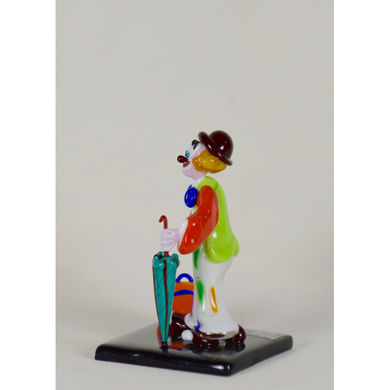 Clown con ombrello e valigia Clown con ombrello e valigia